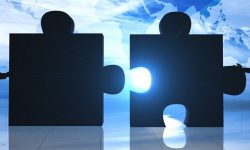 World Business teamwork puzzle pieces